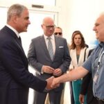 Ralph de la Torre, the founder and former chief executive of Steward Health Care, shook hands with an employee of one of Malta's public hospitals as Armin Ernst, the CEO of Steward Health Care International (center,) looked on in April 2018.