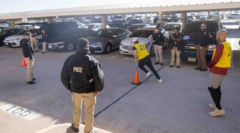 Potential Dallas police officers are doing the Illinois Shuttle Run as part of the Army's...