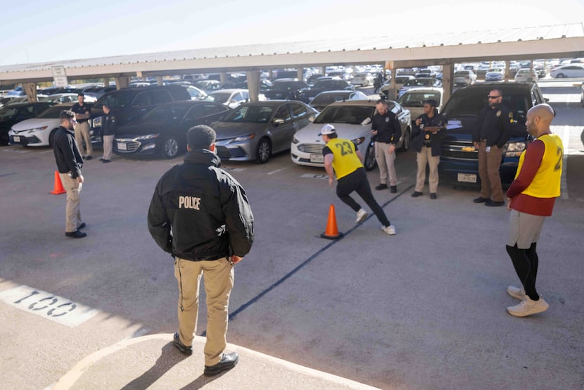 Potential Dallas police officers are doing the Illinois Shuttle Run as part of the Army's...